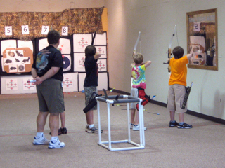 Supervising a group of youth archers
